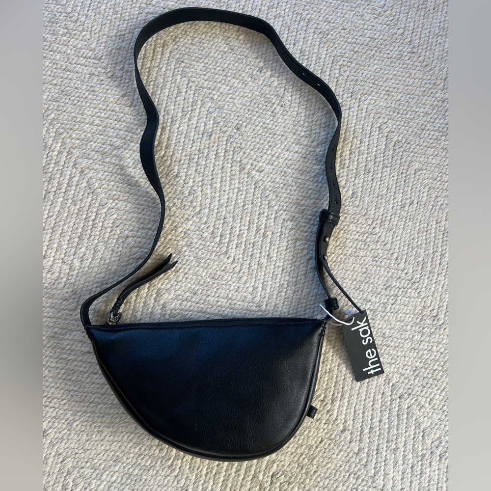The Sak Black Half-Moon Crossbody Bag